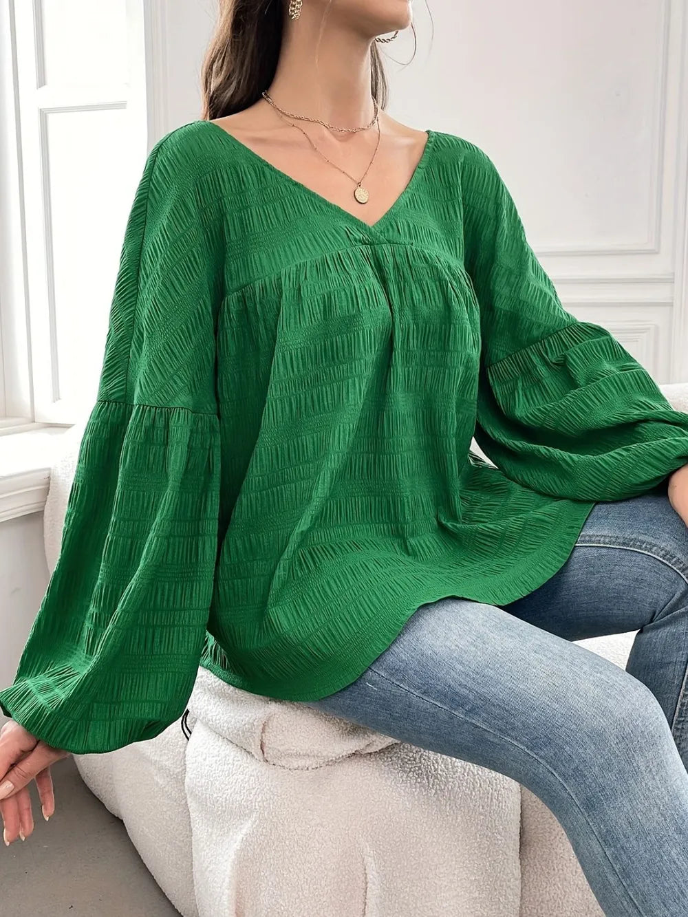 Crinkle texture gathered yoke v-neck in dark green, styled on model 2