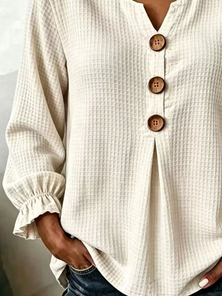 Waffle knit notched v-neck big buttons in beige, close-up detail 2