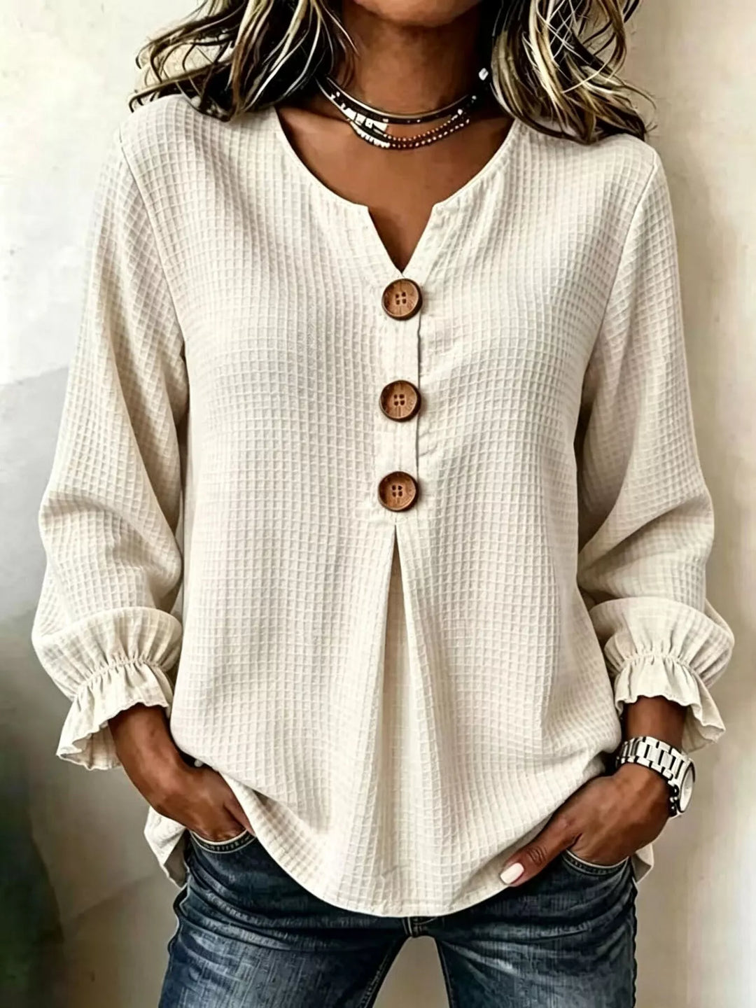 Waffle knit notched v-neck big buttons in beige, front view