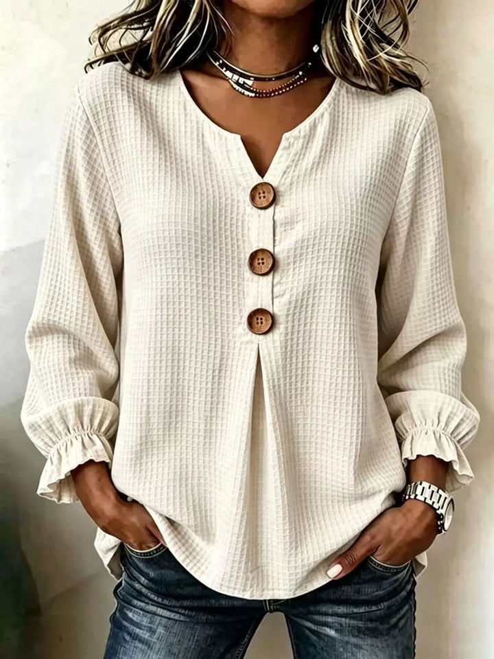Waffle knit notched v-neck big buttons in beige, front view