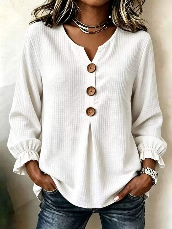 Waffle knit notched v-neck big buttons in white, front view