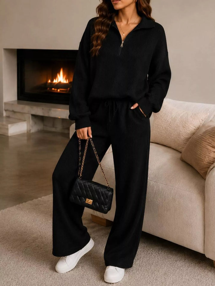 Black ribbed knit lounge set with quarter zip and wide leg pants