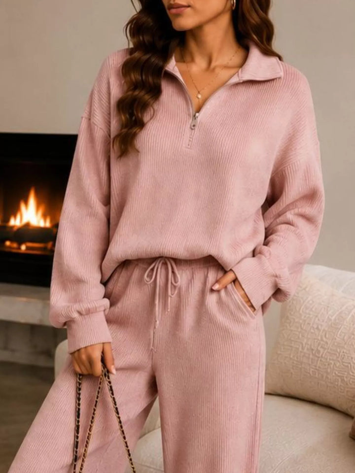 Dusty pink ribbed knit quarter zip top and pants, close view
