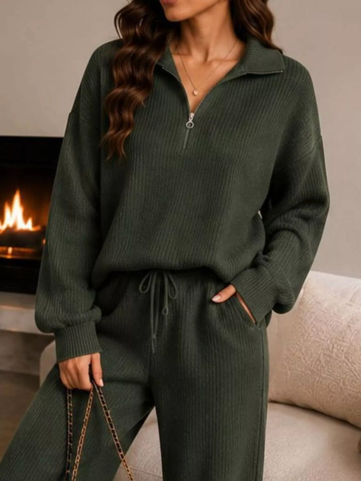 Forest green ribbed knit quarter zip top and pants, closer view