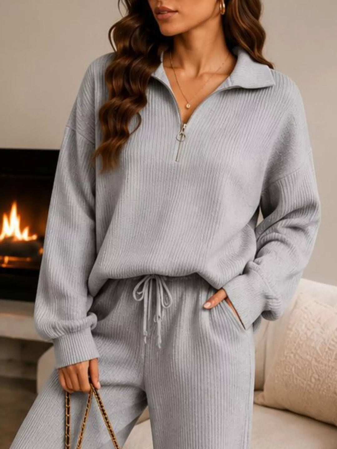 Light gray ribbed knit quarter zip top and pants, closer view