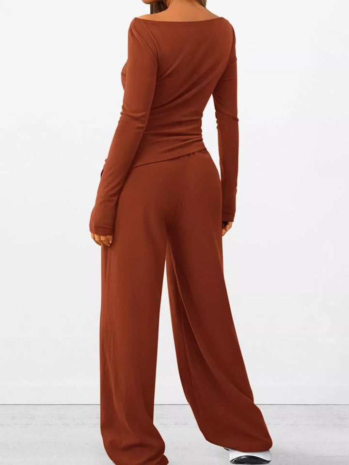 Rust ribbed knit lounge set turned away to show the side and back
