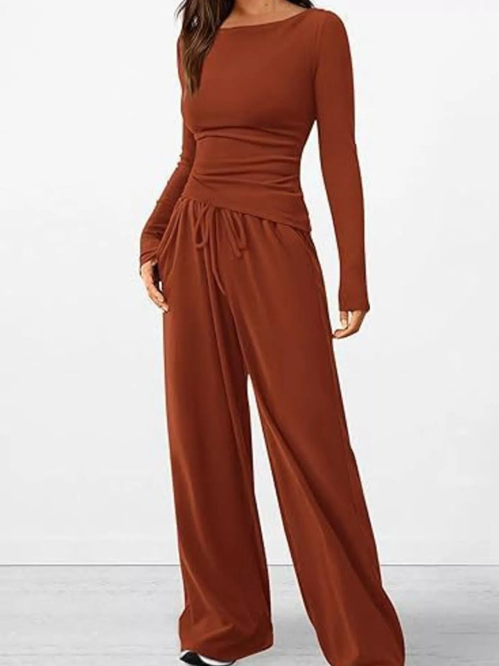Rust ribbed top and drawstring wide leg pants, front view with hand in pocket