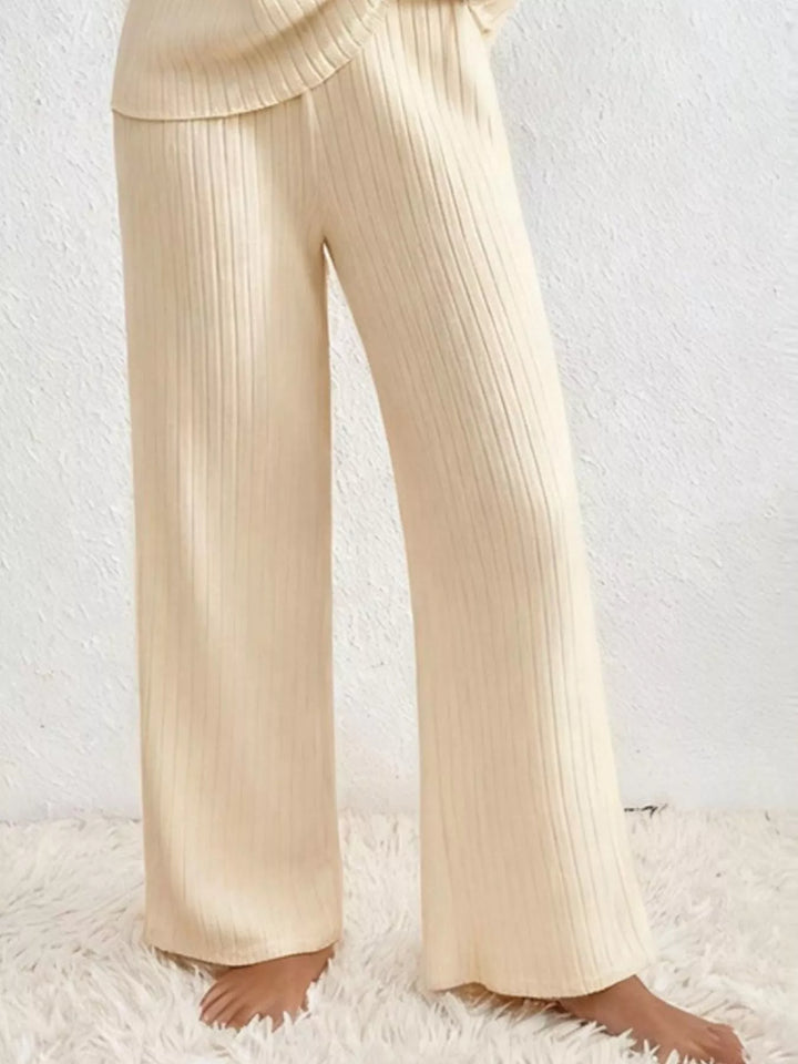 Cream ribbed wide leg pants, lower body view with bare feet