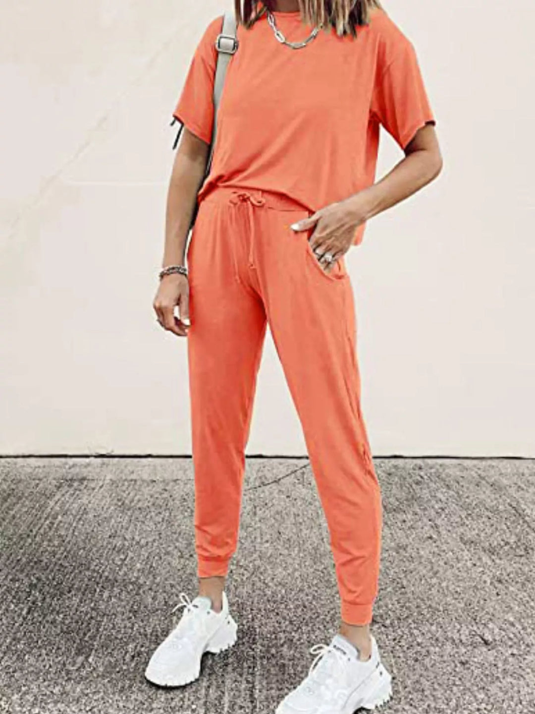 Coral lounge set with a short sleeve tee and tapered jogger pants