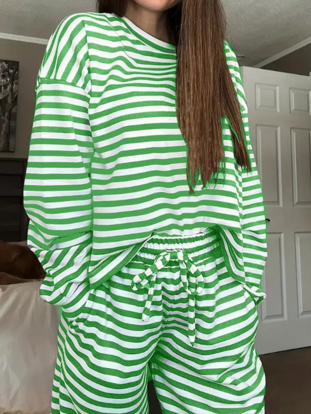 Green striped lounge set with a long sleeve top and drawstring waist pants