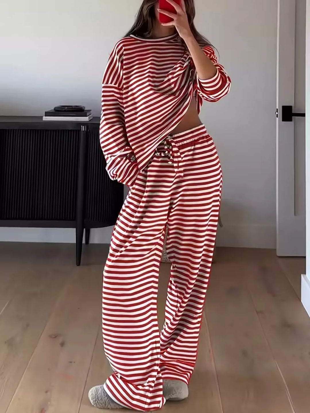 Red striped lounge set with oversized top and wide leg pants, mirror selfie