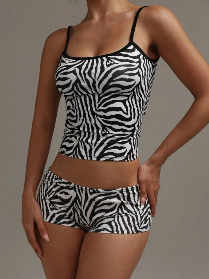 Zebra print satin-look cami and shorts matching set, hand on hip