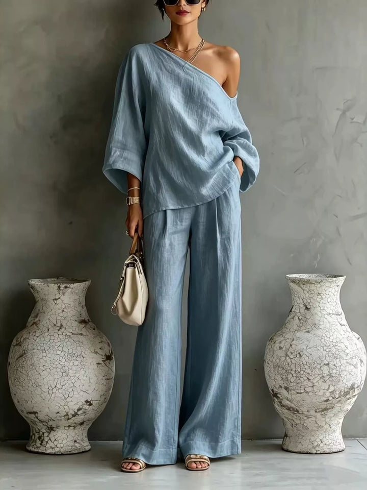 Light blue one shoulder top and wide leg pants set, full-length view