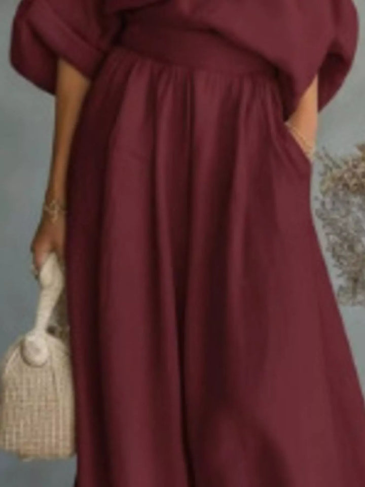 Burgundy wide leg maxi pants with front pocket and woven bag