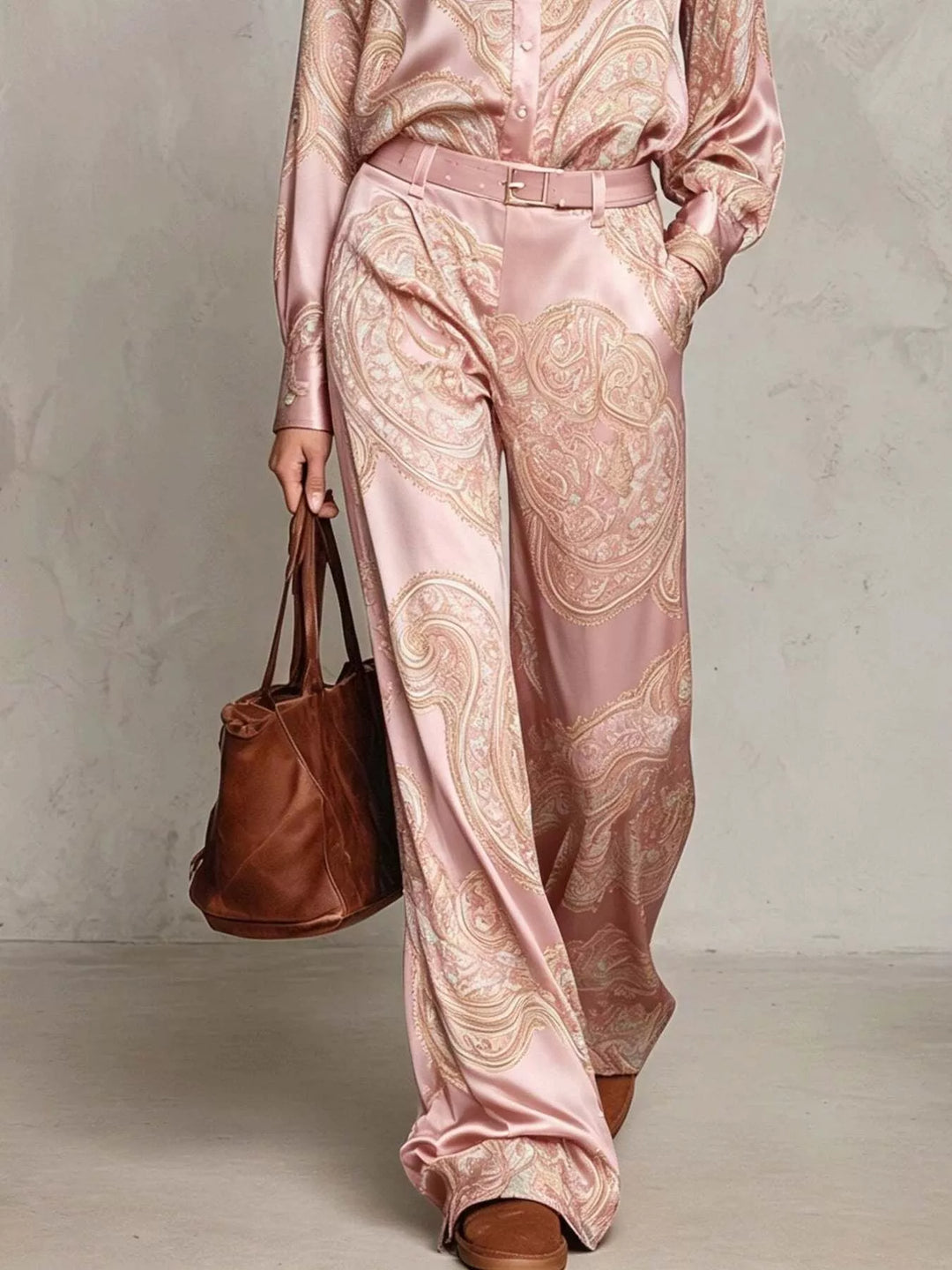 Blush pink paisley wide leg pants and shirt hem with a tote bag
