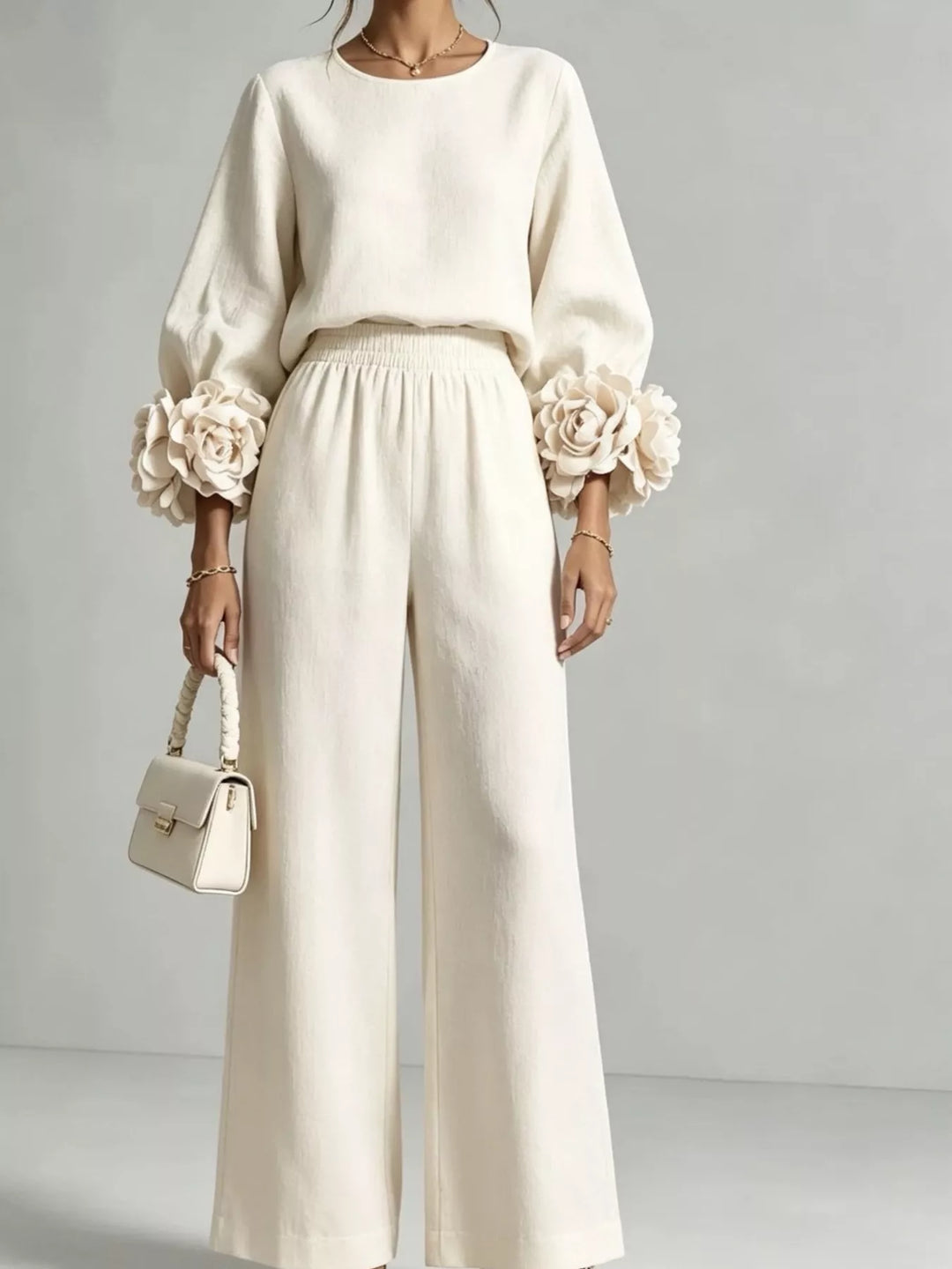 Ivory matching set with puff sleeve rose cuff top and wide leg pants
