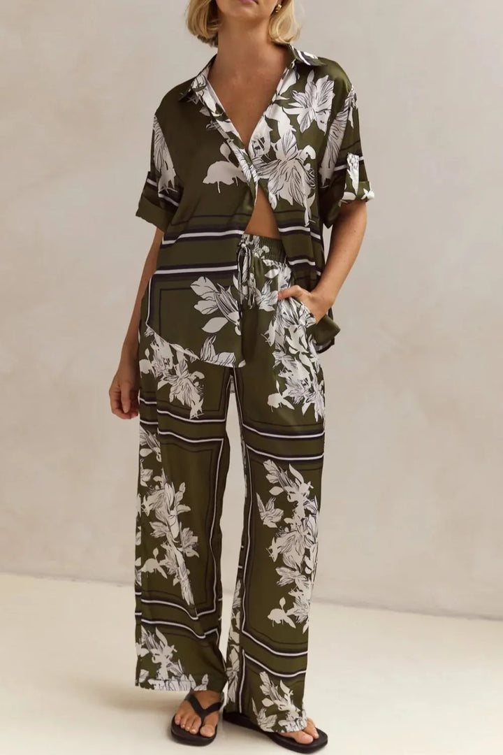 Olive floral matching set with shirt tucked slightly and relaxed pants, full outfit