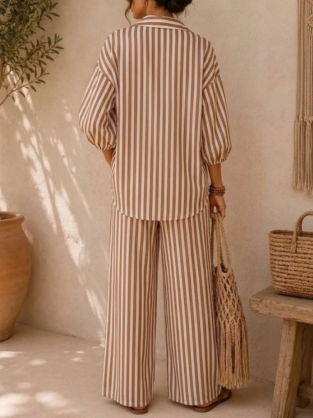 Back view of the camel stripe shirt and wide leg pants set