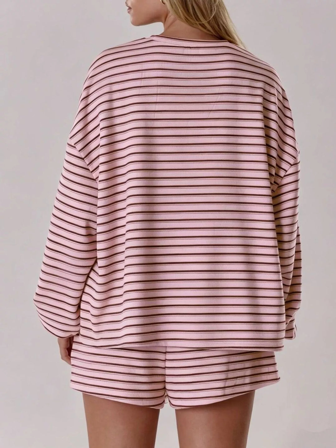 Striped long sleeve top and drawstring shorts in pink, back view