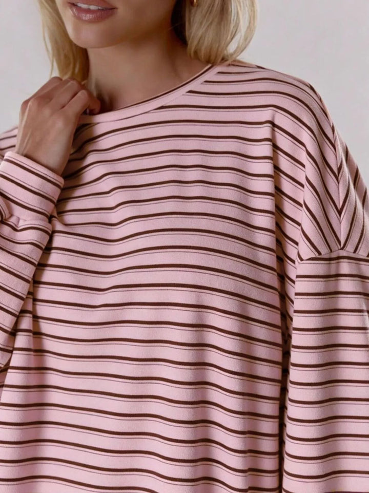 Striped long sleeve top and drawstring shorts in pink, close-up detail