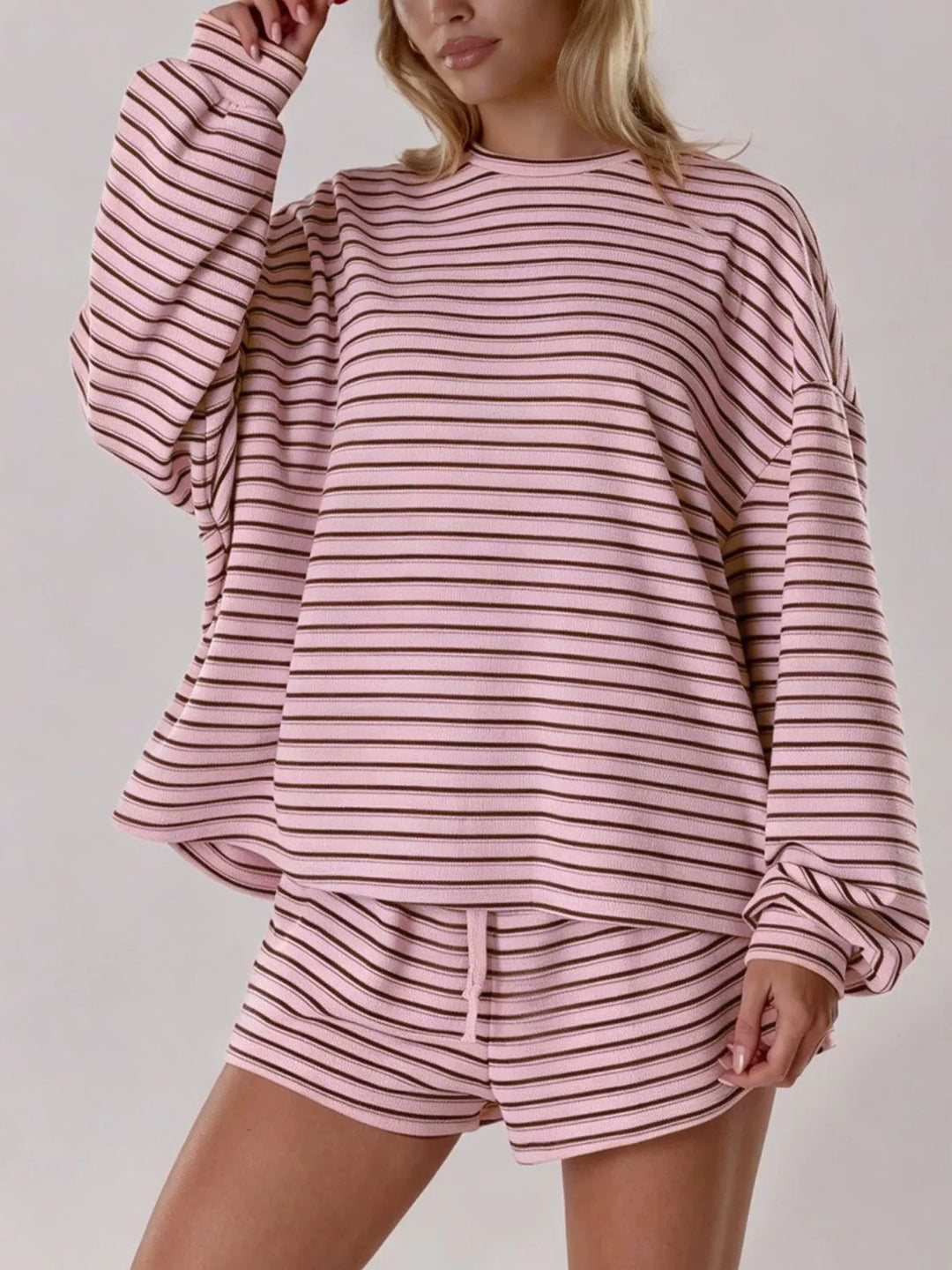 Striped long sleeve top and drawstring shorts in pink, front view