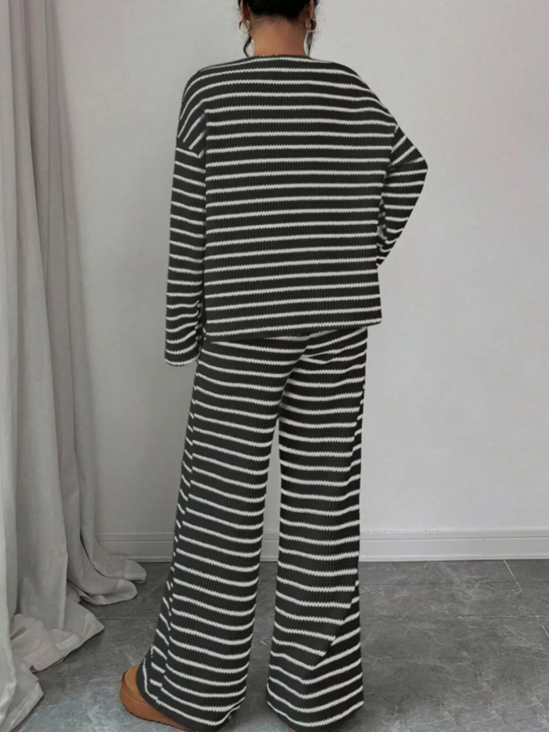 Striped waffle knit top and wide leg pants in black, back view