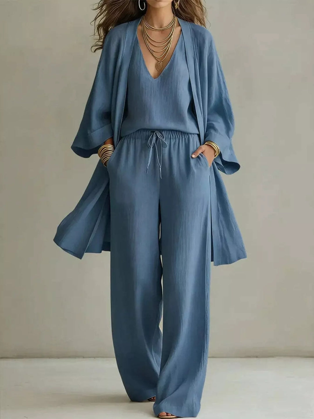 Three piece v neck top, cardigan and pants in blue, front view