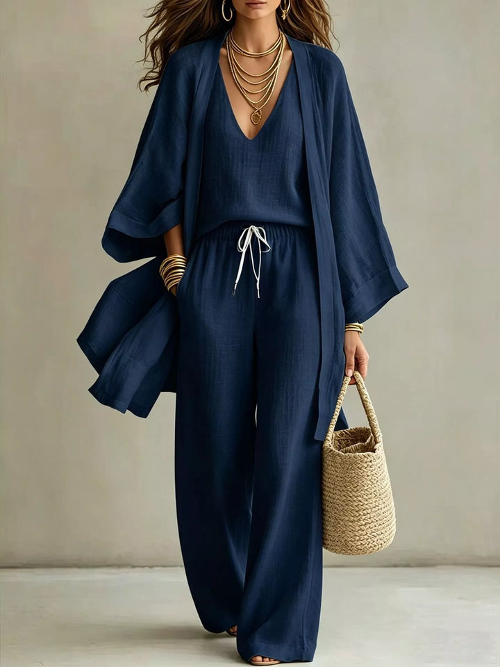 Three piece v neck top, cardigan and pants in navy, front view