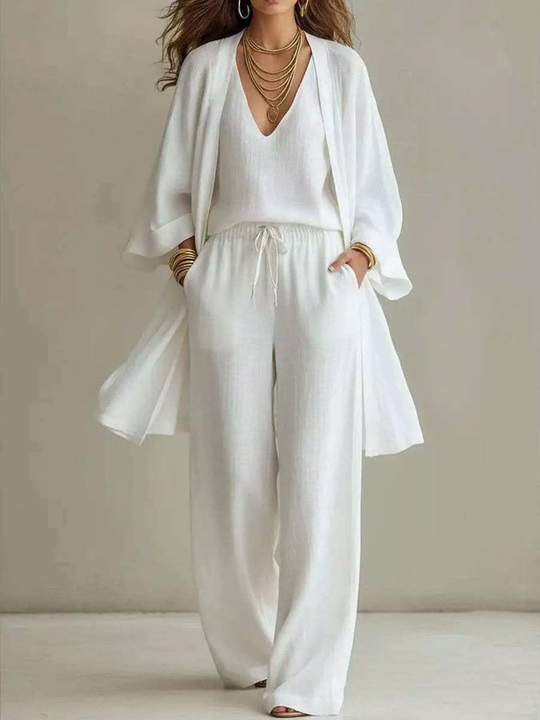 Women's matching set in white, three piece v neck top, cardigan and pants