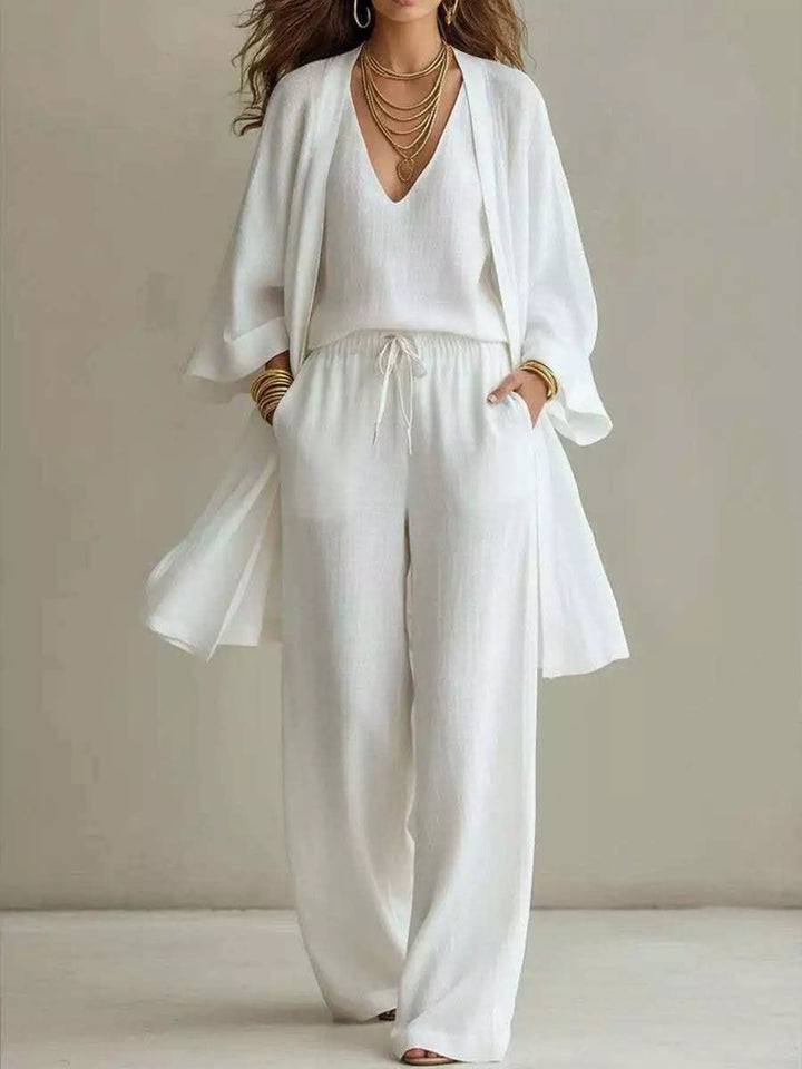 Women's matching set in white, three piece v neck top, cardigan and pants