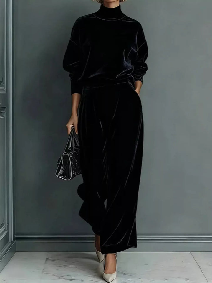 Velvet-look mock neck top and wide leg pants in black, front view