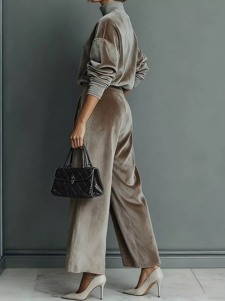 Velvet-look mock neck top and wide leg pants in light brown, styled on model