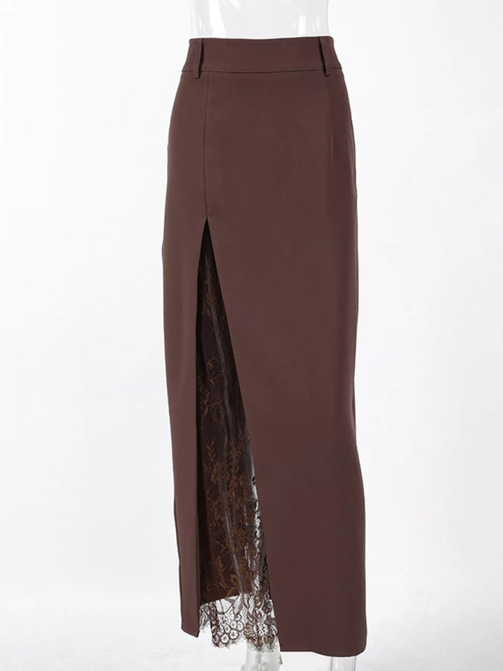 Chocolate brown high waisted maxi skirt on a mannequin, front slit with lace