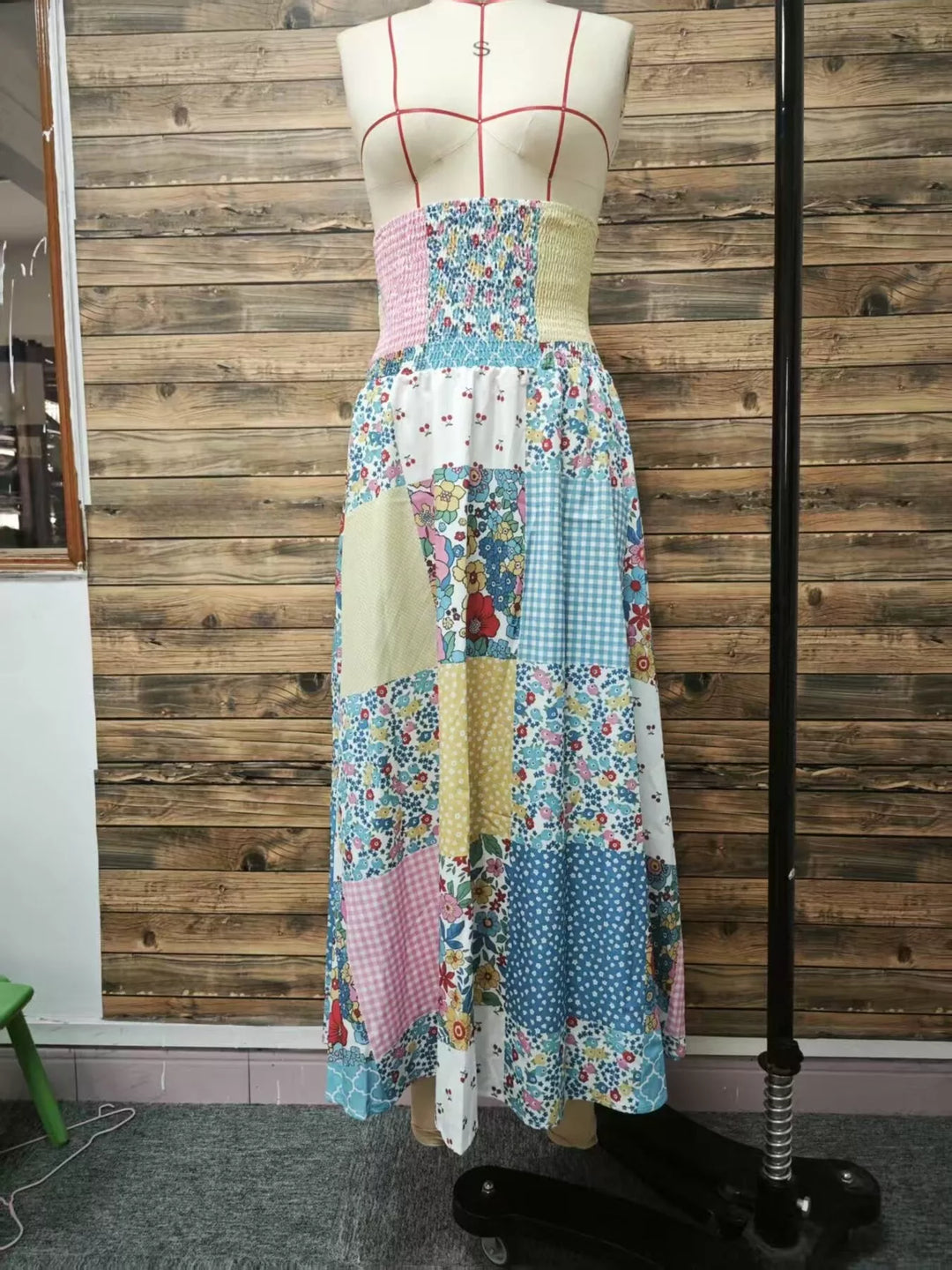 Patchwork floral maxi skirt on a mannequin, front view
