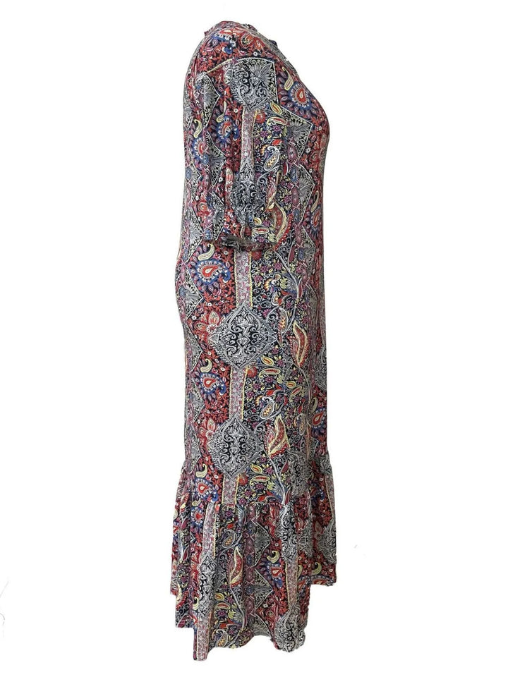 Paisley print ruffle hem tiered skirt plus size in red, styled on model