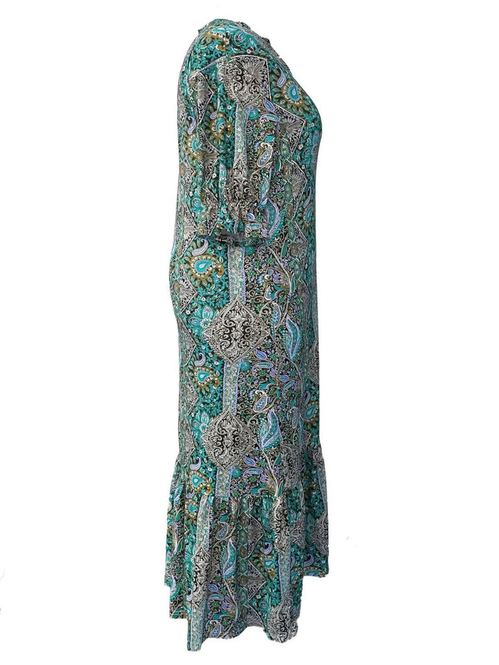 Paisley print ruffle hem tiered skirt plus size in teal, styled on model