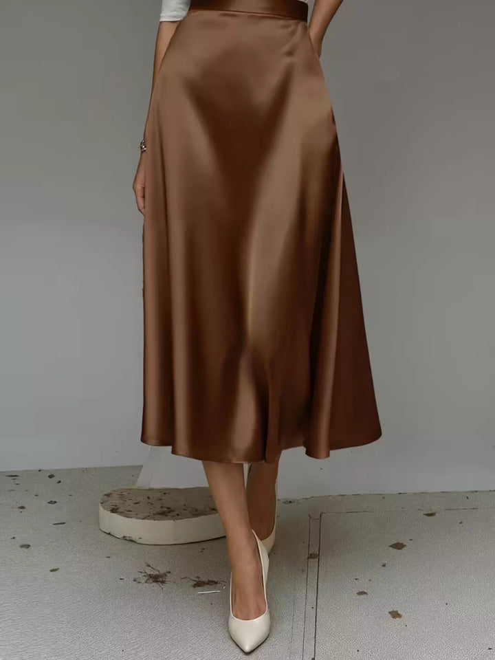 Back view of the chocolate brown high waisted satin look midi skirt