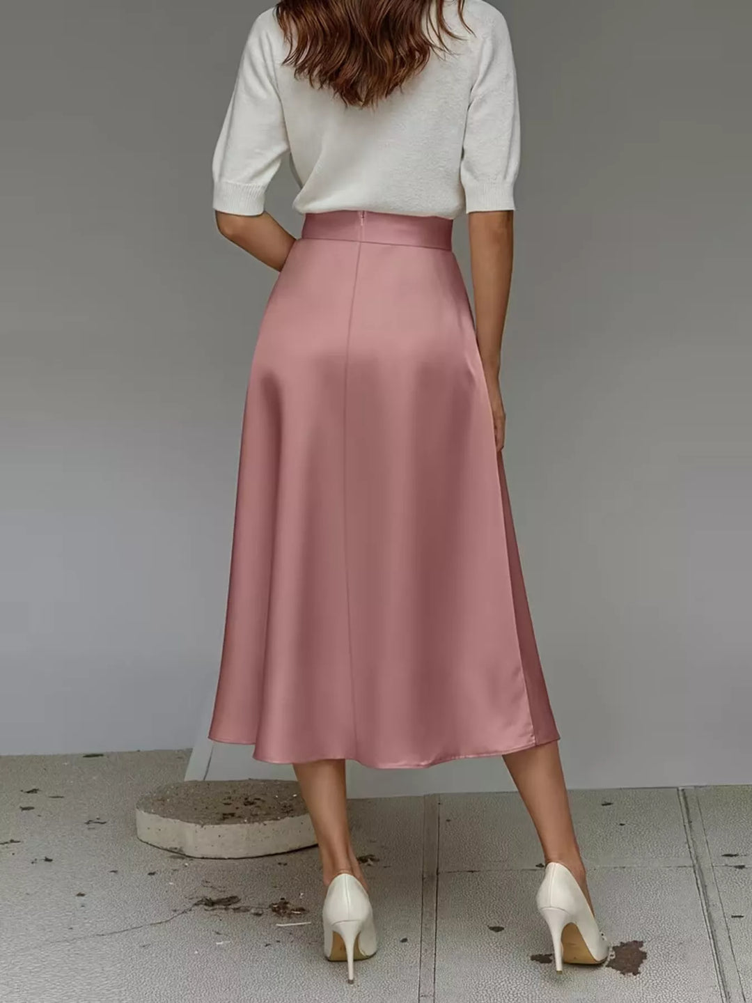 Back view of the dusty rose high waisted satin look midi skirt