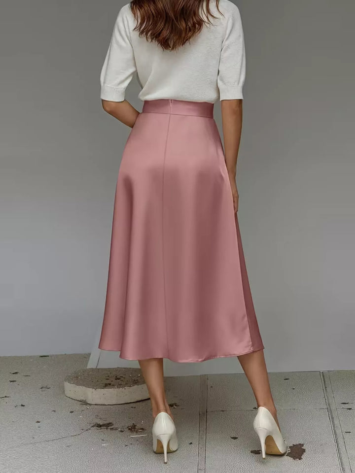 Back view of the dusty rose high waisted satin look midi skirt