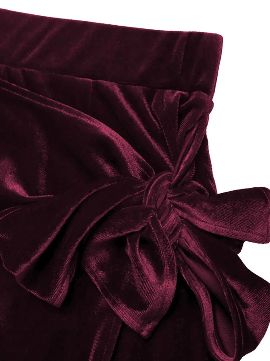 Close-up of the burgundy skirt bow tie waist detail