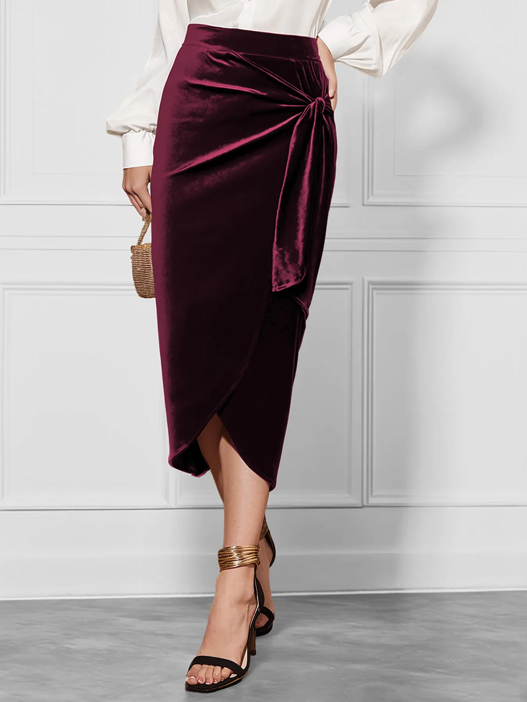 Burgundy wrap midi skirt with side bow, worn with a cream blouse and heels