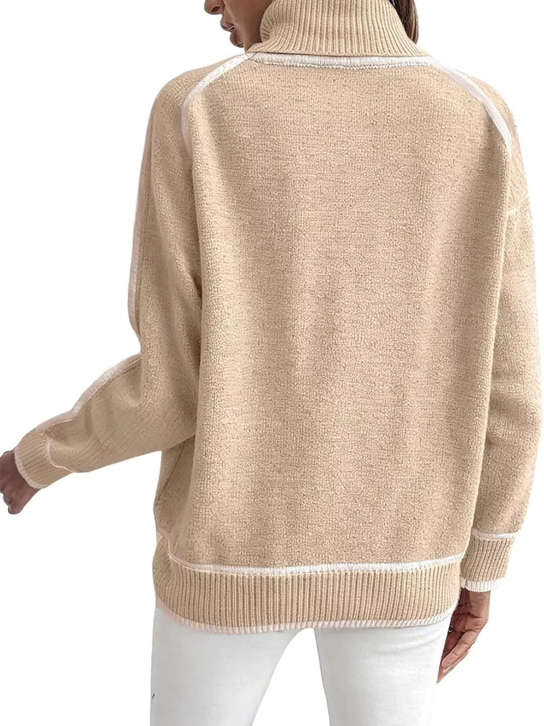 Beige mock neck sweater with white piped hem, shown from the back