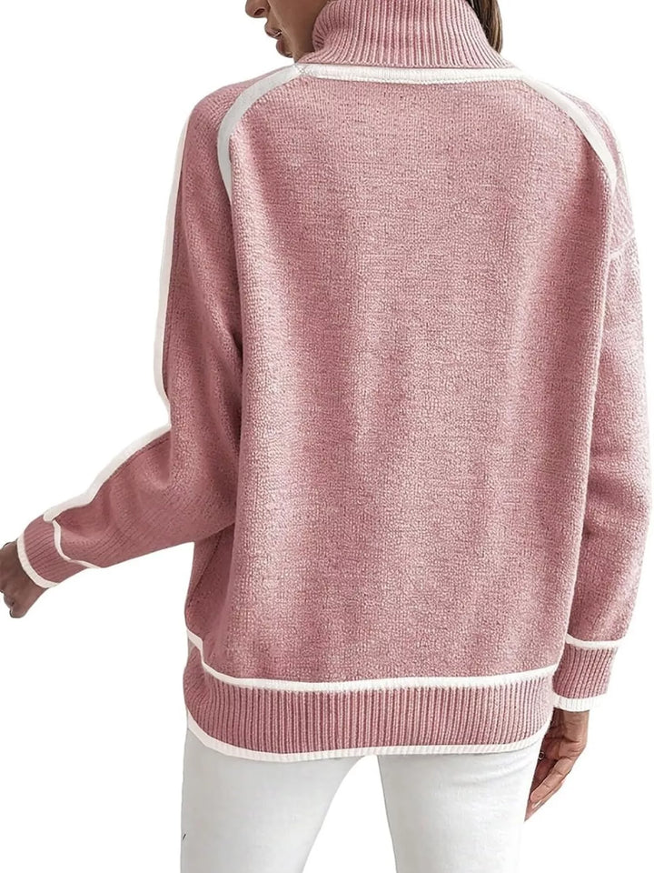 Dusty pink mock neck sweater with white piped hem, back view