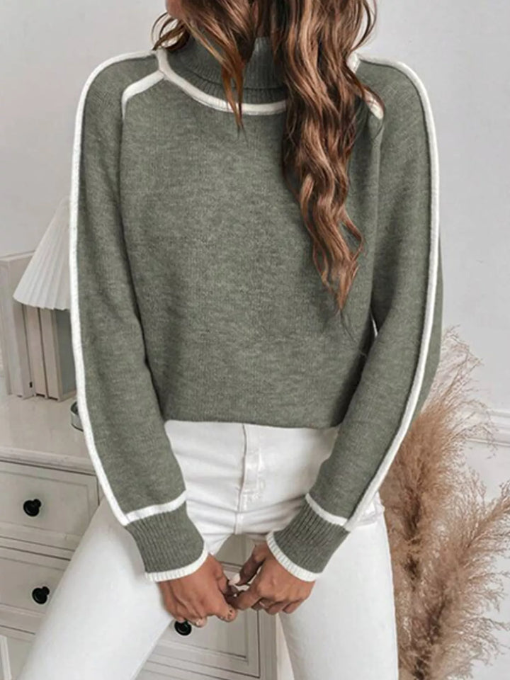 Women's mock neck sweater in olive with white raglan sleeve contrast piping
