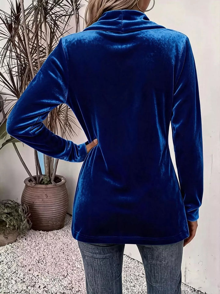 Back view of the royal blue velvet-look cardigan with shawl collar