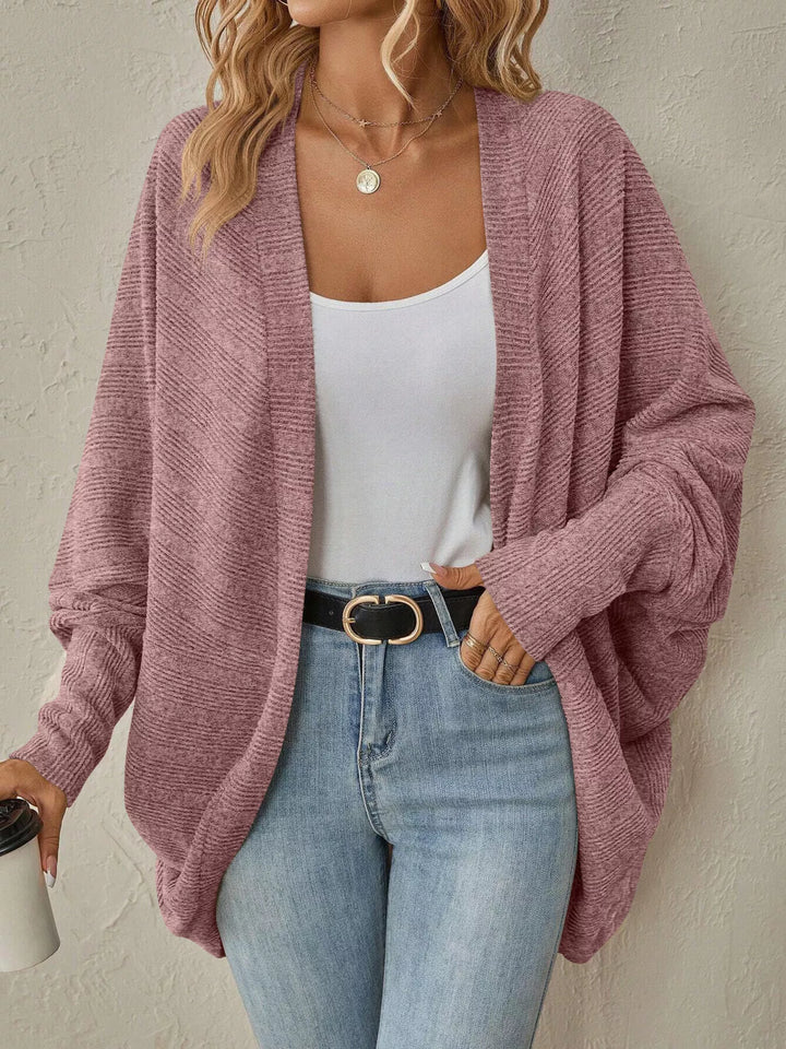 Dusty rose cocoon cardigan worn open over a white tank and jeans