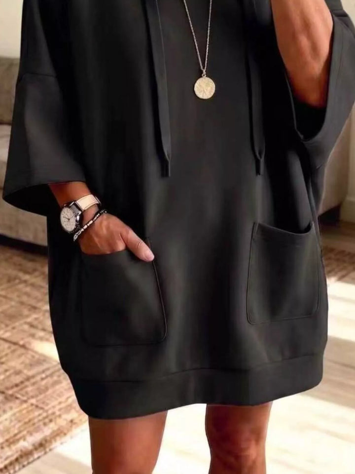 Dress-length wide sleeves big front pocket in black, close-up detail