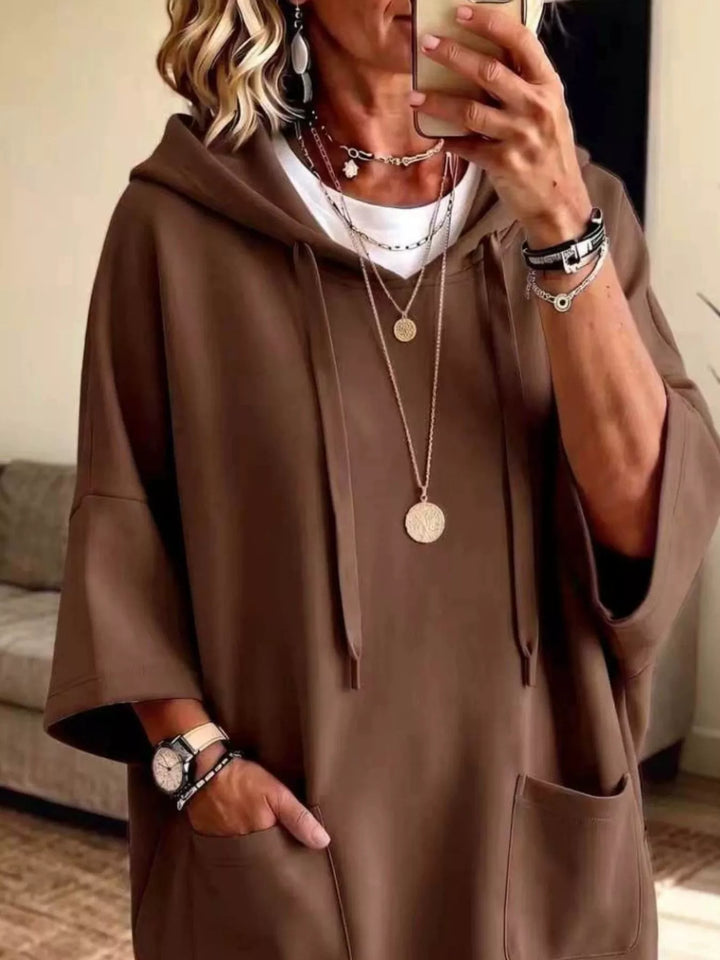 Dress-length wide sleeves big front pocket in brown, close-up detail 2