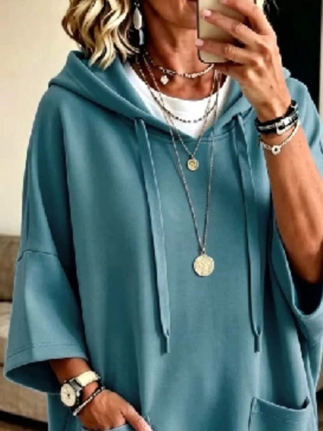 Dress-length wide sleeves big front pocket in turquoise, close-up detail 2