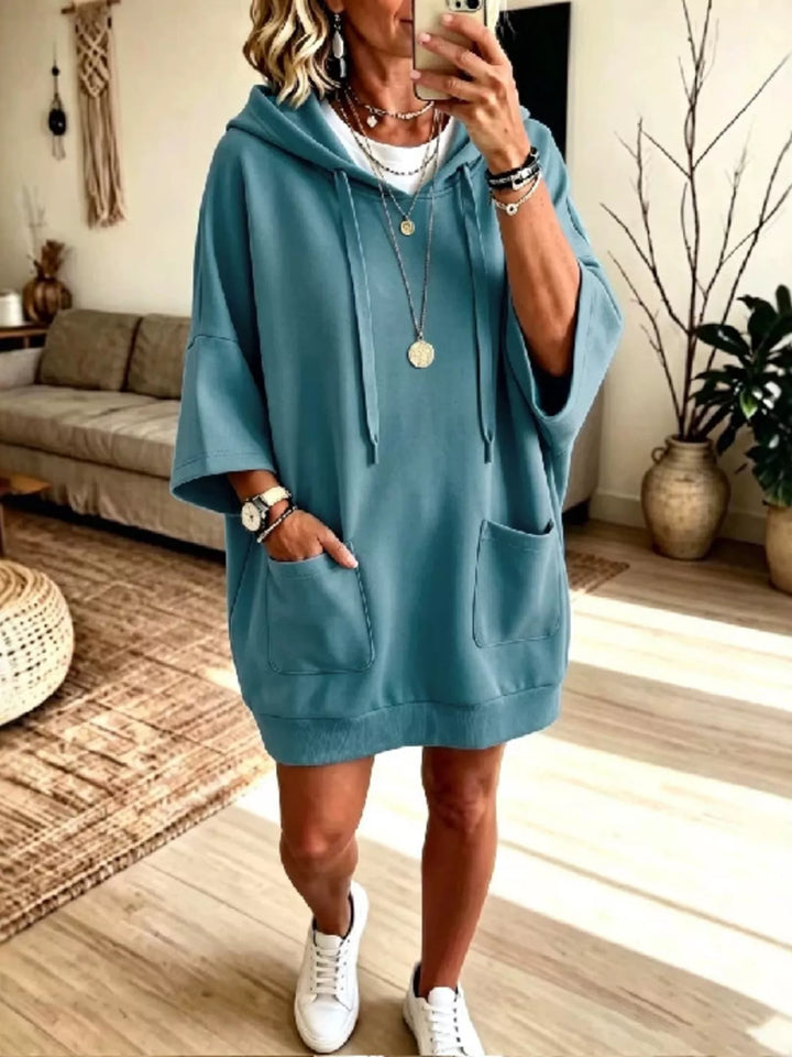 Dress-length wide sleeves big front pocket in turquoise, front view